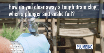 How do you clear away a tough drain clog when a plunger and snake fail?